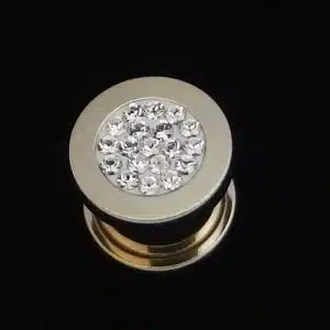 Gold ear flesh tunnel