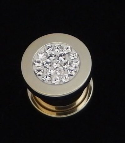 Gold ear flesh tunnel
