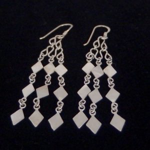 Long dangling silver earring