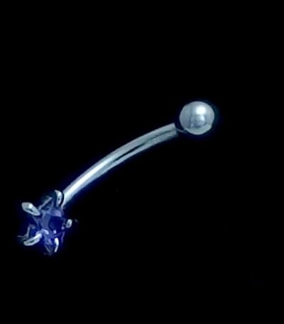 Amethyst eyebrow piercing