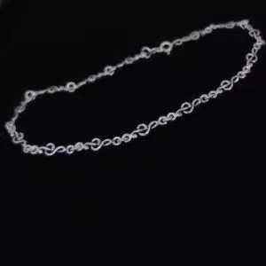 Silver Treble clef bracelet